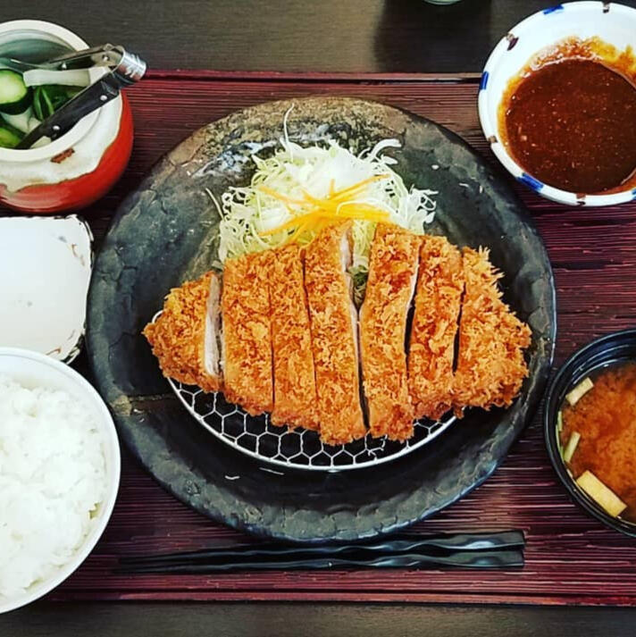 A plate of tonkatsu and cabbage.